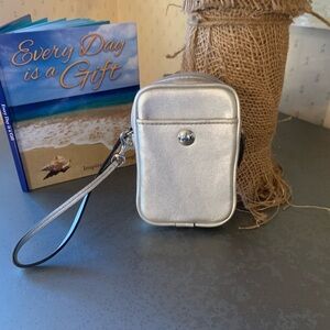 COACH, small Metallic SILVER leather wristlet, ect, pocket on front. ZIPS.